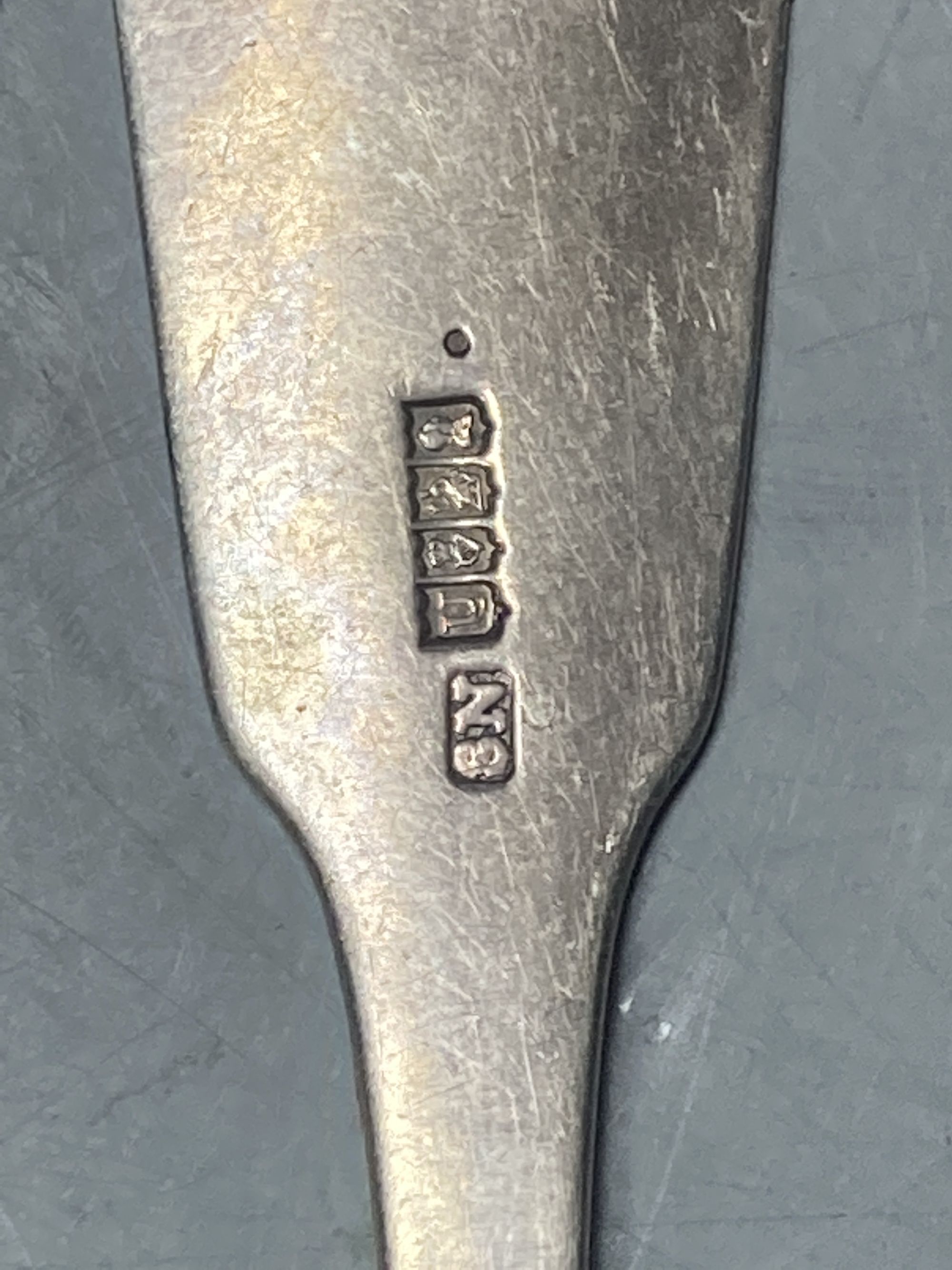 A pair of late George III Irish silver fiddle pattern table spoons, Samuel Neville, Dublin, 1816/17, 29.7cm, 7.5oz.